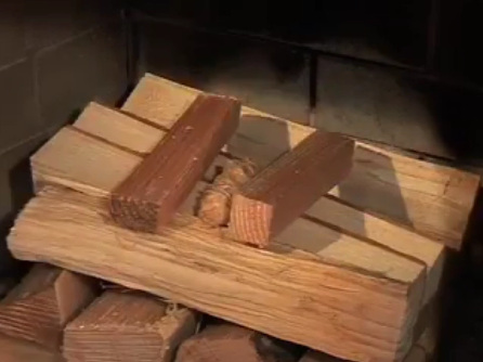 Wood pile with
                                    firing module at the top 01