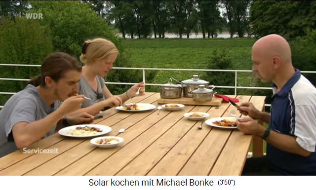 Big dinner with box cooker meals in
                  stainless steel pots