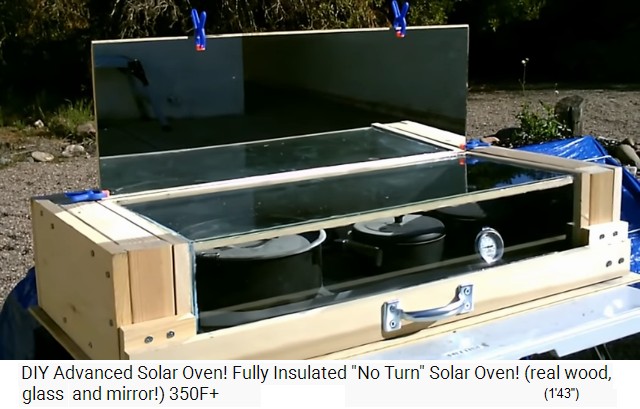 The solar oven with black pots and pan 02