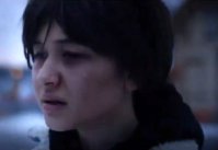 Jaily at the
                  railway crossing with tear on her cheek before suicide
                  (actor)