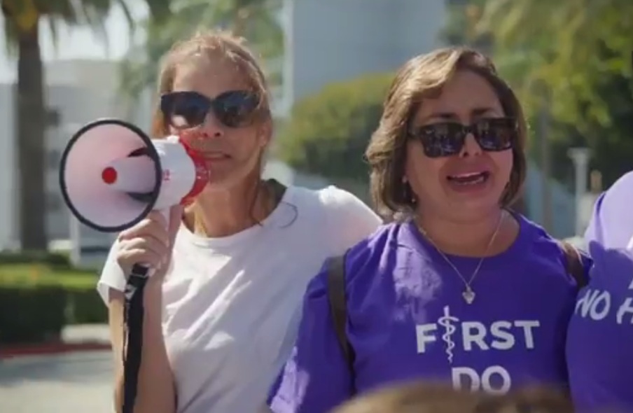 Demo against the Trans mania with
                  loudspeaker, mother Abigail