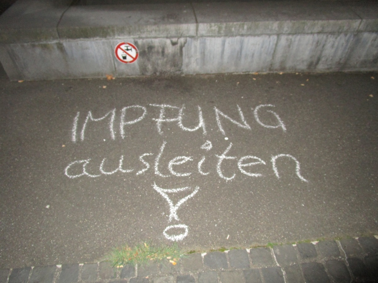 Resistance in Basel with chalk graffito:
                        Discharge vaccination! - October 2023