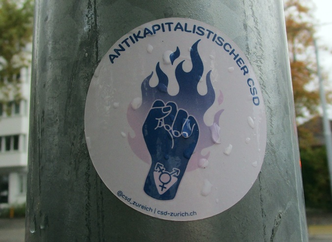 Pegatina
                                  criminal del ANTIFA en Z�rich con el
                                  pu�o de Antifa y el s�mbolo de g�nero
                                  integrado en la mu�eca - 26-10-2023