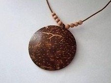 Jewelry made of coconut shell, a
                  pendant in the form of a sun