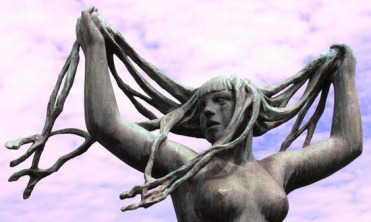 Bare breasts of a statue