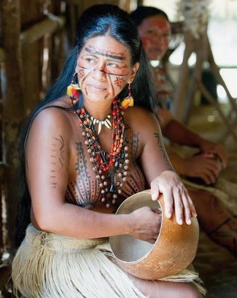 Woman topless in Amazon jungle, Desana natives, painted breast