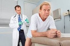 Proctologo con
                paziente