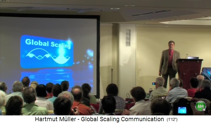 Dr. Hartmut Müller am
                        Rednerpult 2008 mit Publikum und Projektionswand
                        - da war er schon ein grosser Betrüger
