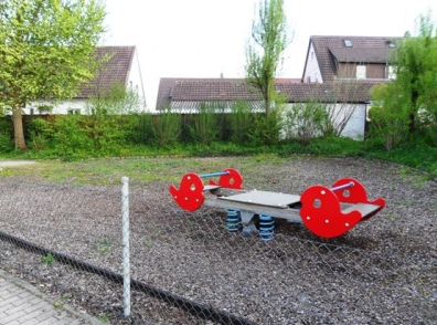 Broad spring seesaw with four spiral
                              springs in Muehlacker-Enzberg,
                              Baden-Wuerttemberg, Germany