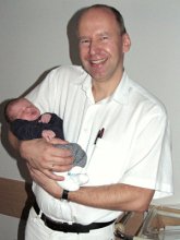 Un ginec�logo (aqu�: Dr.
                                Gross con un bebe)