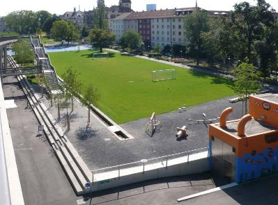 Playground sections
                                                with fields and
                                                playground devices,
                                                Dreirosen Park
                                                ("Three Roses
                                                Park") in Basel,
                                                Switzerland