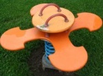 Nice spring rider 05
                              for four children showing a flower,
                              Ibbenbueren, Germany